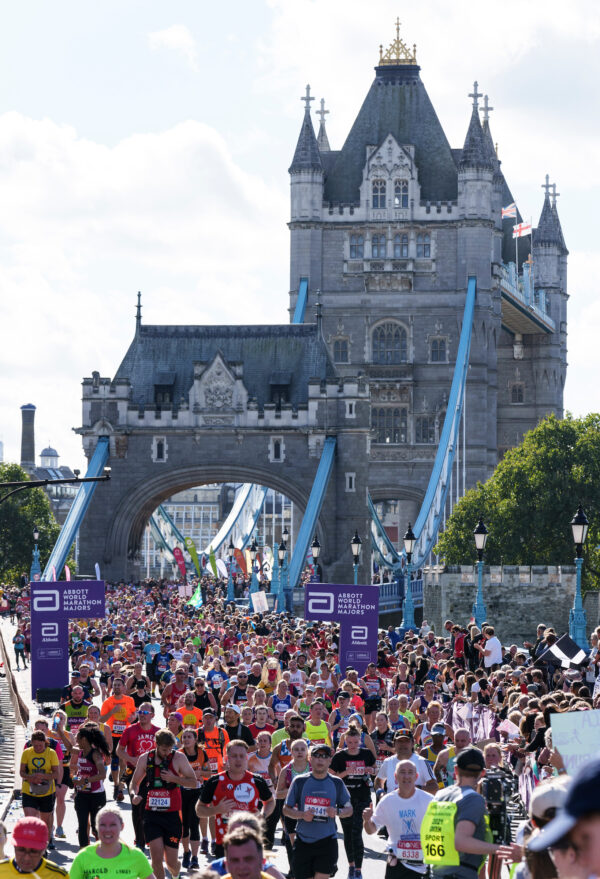 General view of runners crossing Tower Bridge London Marathon